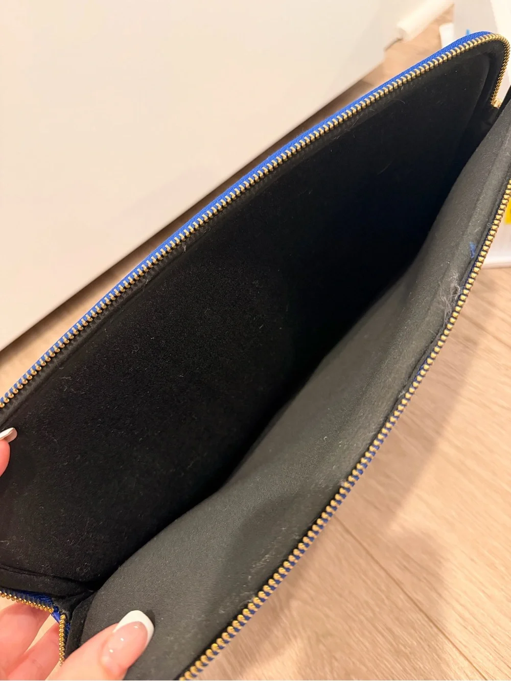 kate spade royal blue zip laptop sleeve with gold logo